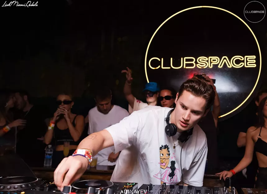Mau P behind the decks at Club Space