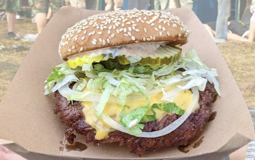 a cheeseburger with lettuce