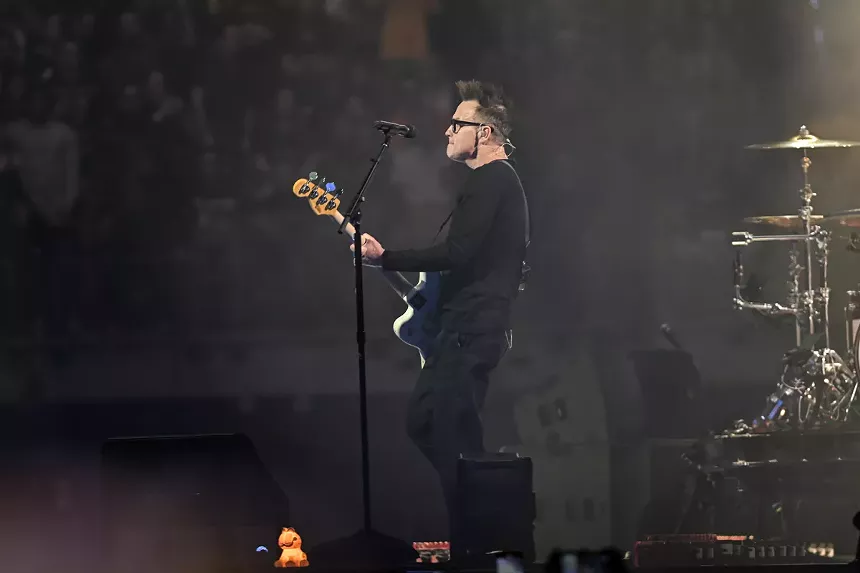 Mark Hoppus on stage at Kaseya Center