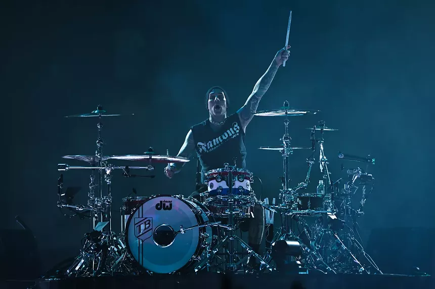 Travis Barker on stage at the Kaseya Center