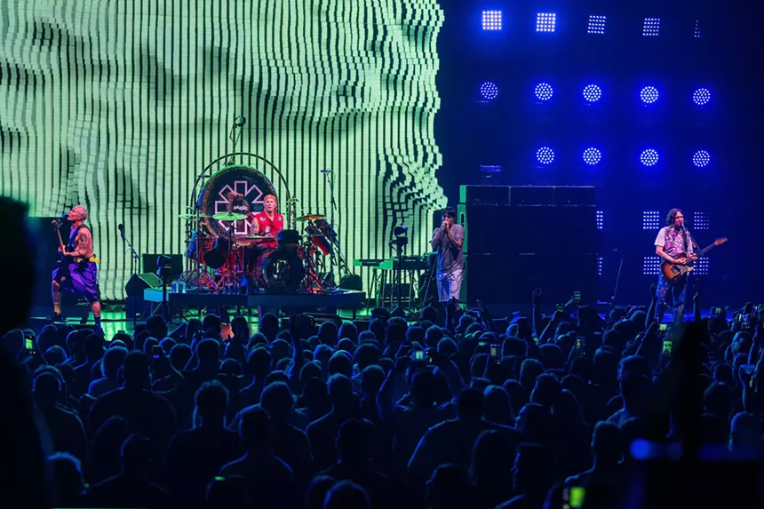 Red Hot Chili Peppers performing on stage at Hard Rock Live