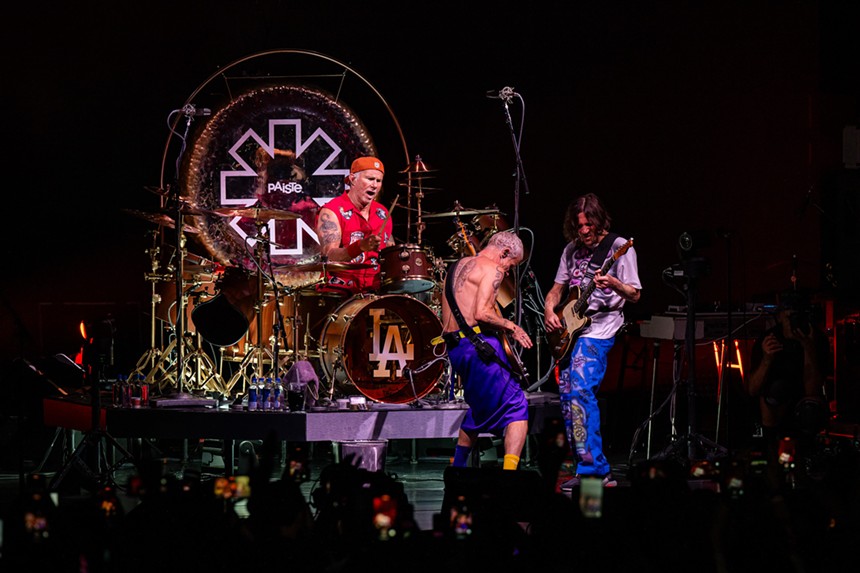 Red Hot Chili Peppers performing on stage at Hard Rock Live