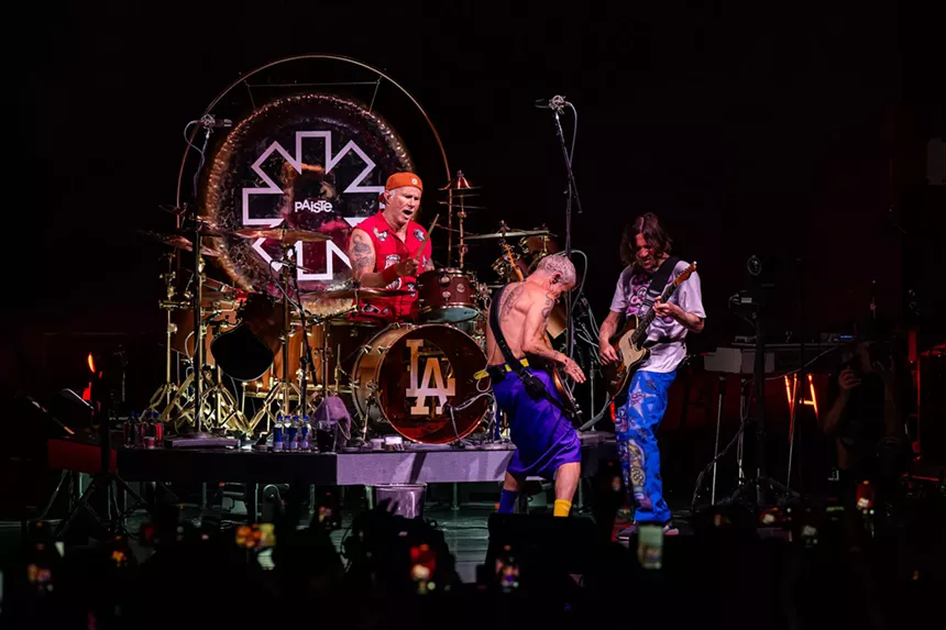 Red Hot Chili Peppers performing on stage at Hard Rock Live