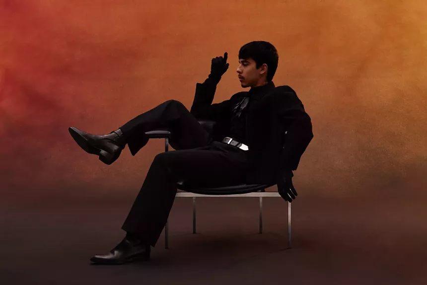 Ivan Cornejo leaning back on a chair