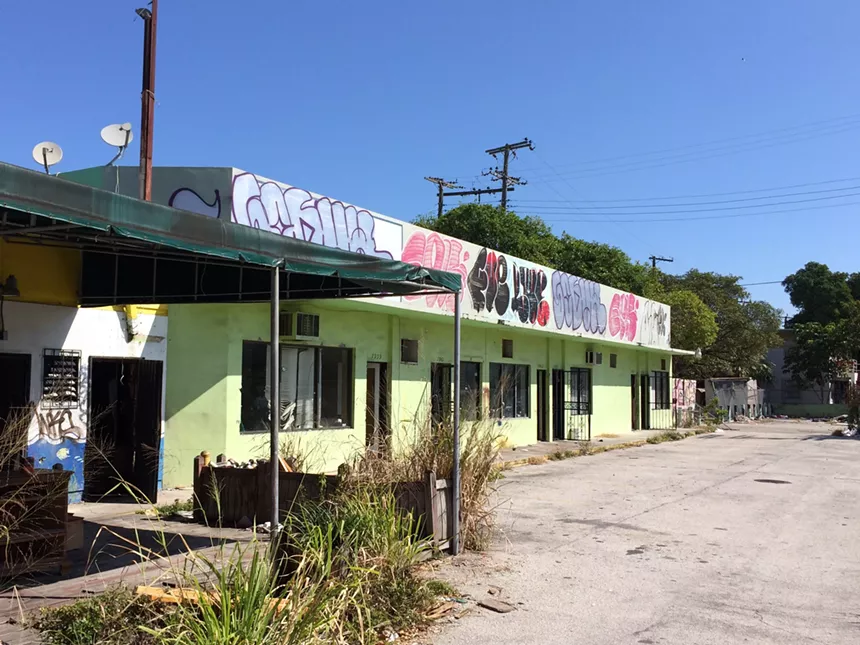 An abandoned building in Miami with graffiti on it