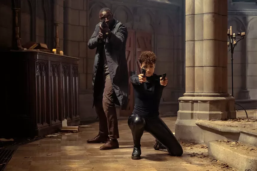 Still of Omar Sy and Nathalie Emmanuel in The Killer