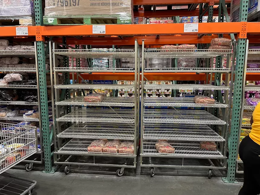 Empty bread shelves at Costco in North Miami