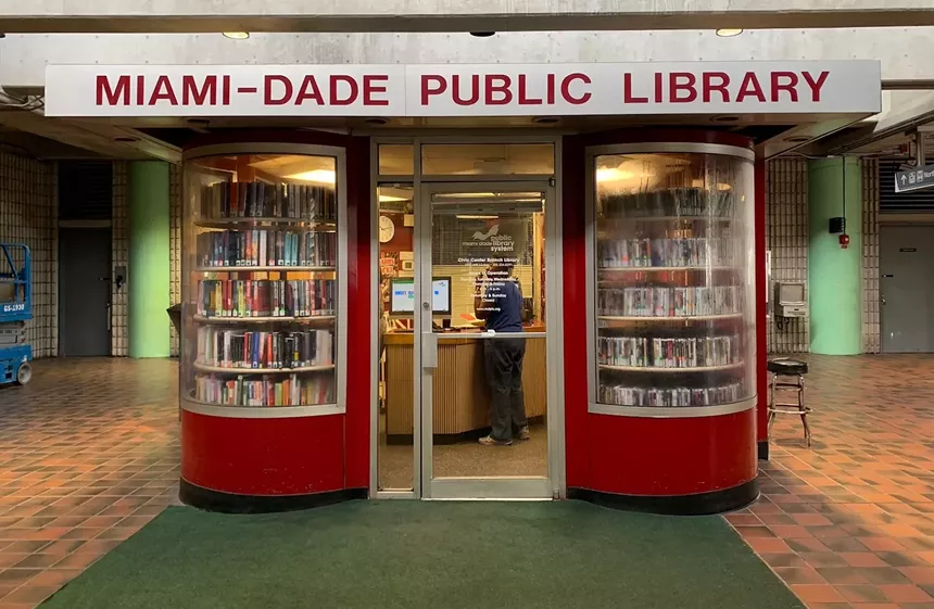 photo of a mini-library at a light rail station in Miami, Florida
