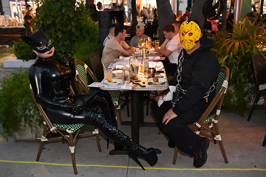 People in costume on Halloween night on Lincoln Road in Miami Beach