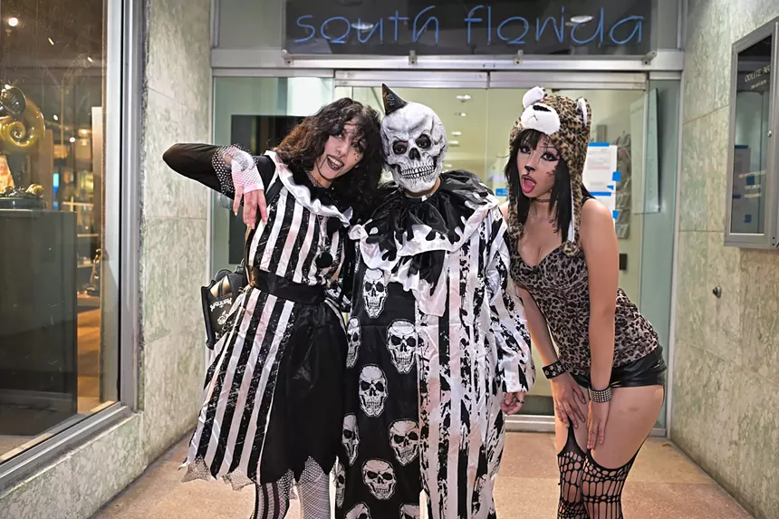 People in costume on Halloween night on Lincoln Road in Miami Beach