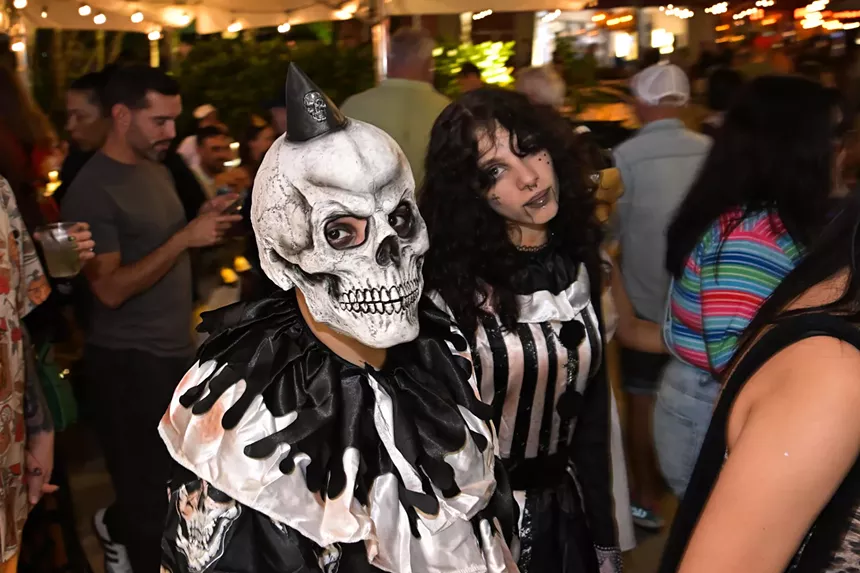 People in costume on Halloween night on Lincoln Road in Miami Beach