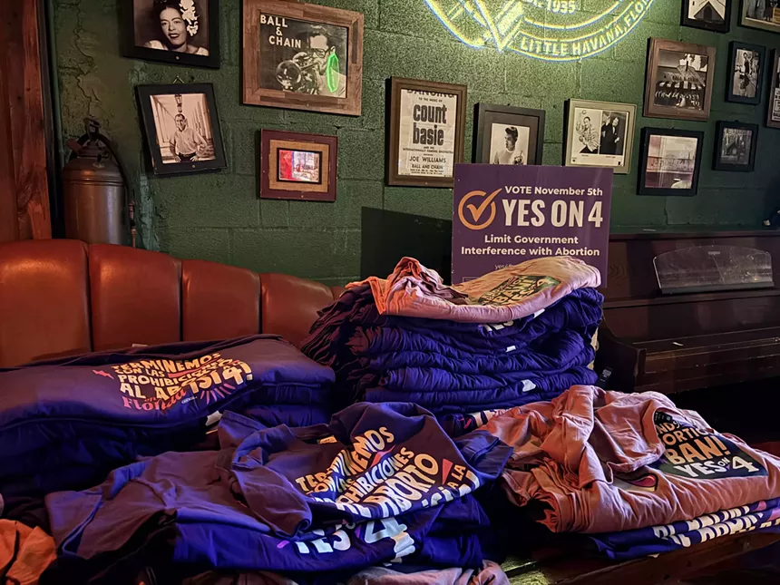 A table at Ball & Chain filled with "Yes on 4" merch