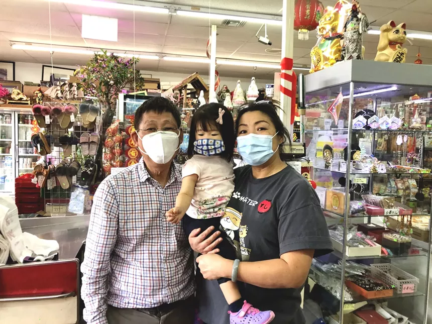 three people in a store