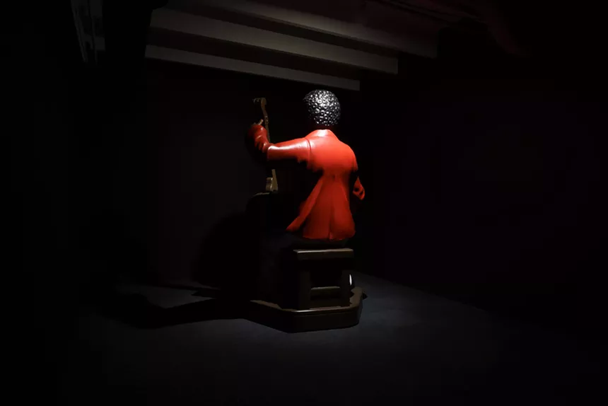 Installation view of Reginald O'Neal's sculpture The Cellist