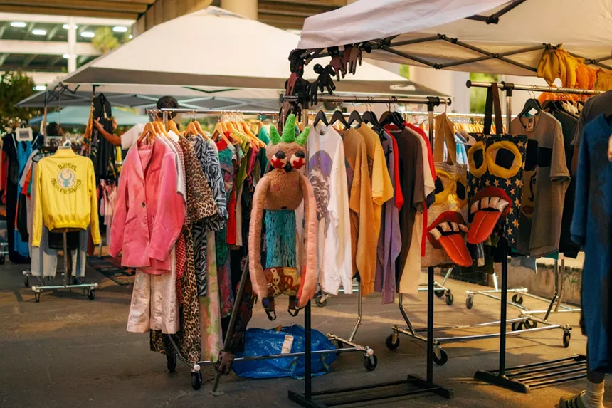 Clothing hanging from a rack at OurMaket at Lot 11 Skatepark in Miami
