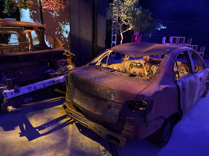 A burned out car from the attack
