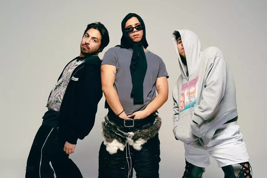 3 members of Latin Mafia posing for a photo