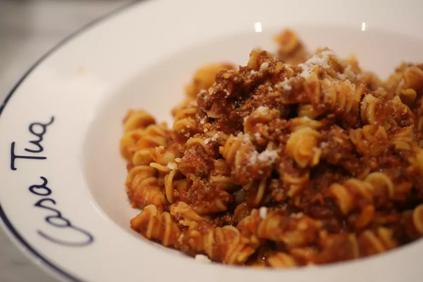 A pasta dish in a white plate