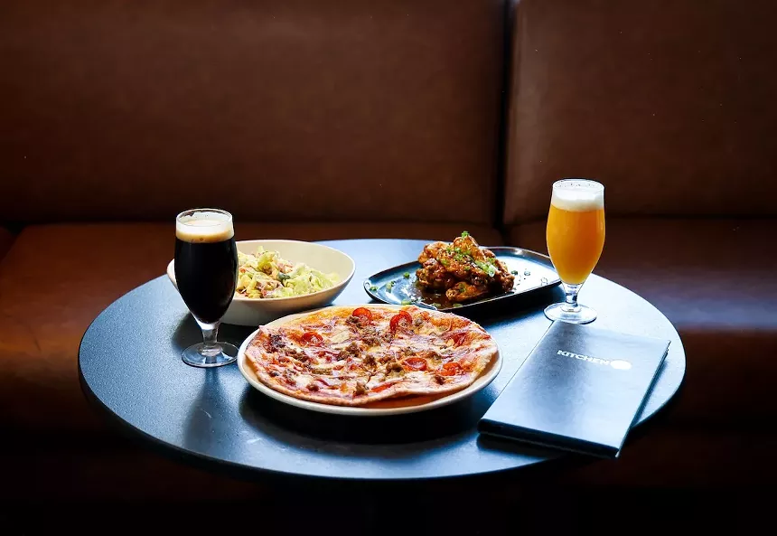 pizza and drinks on a table