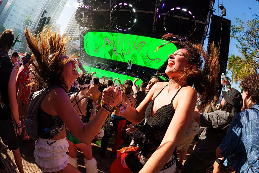 Two women dancing at Ultra Music Festival Miami