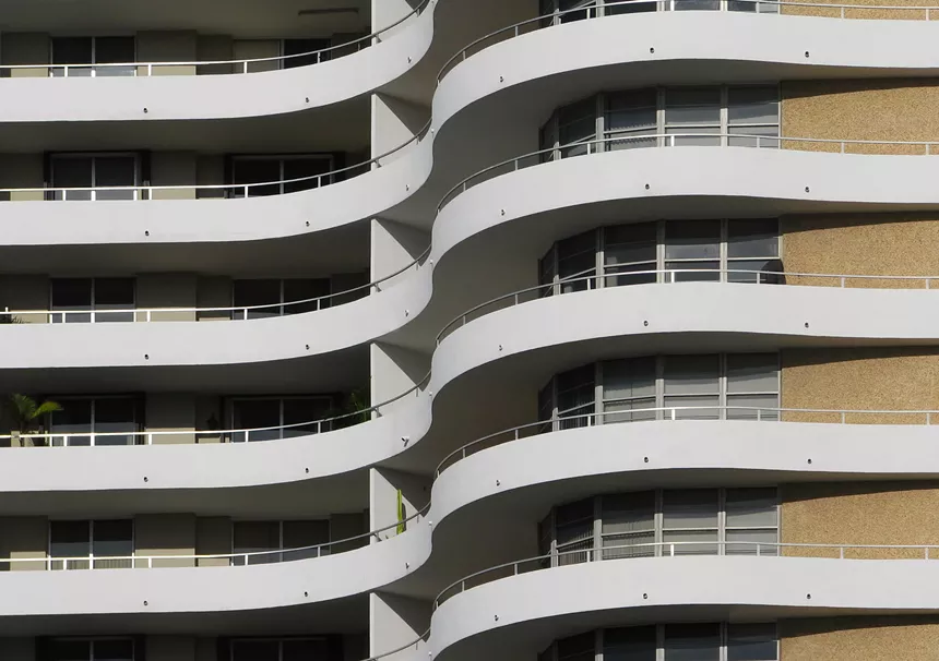 Oceanside Plaza condominium, a white curvy building