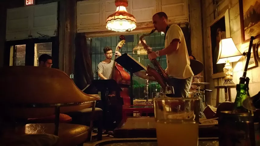 jazz band playing inside restaurant