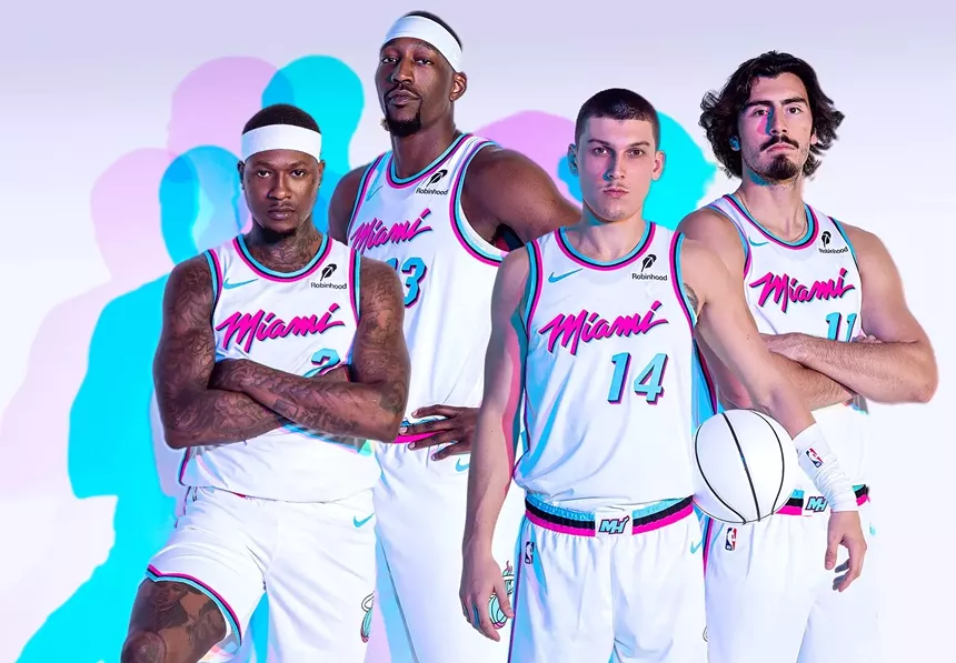 Terry Rozier, Bam Adebayo, Tyler Herro, and Jaime Jaquez Jr. model the Heat's rebooted white Miami Vice-inspired uniforms.
