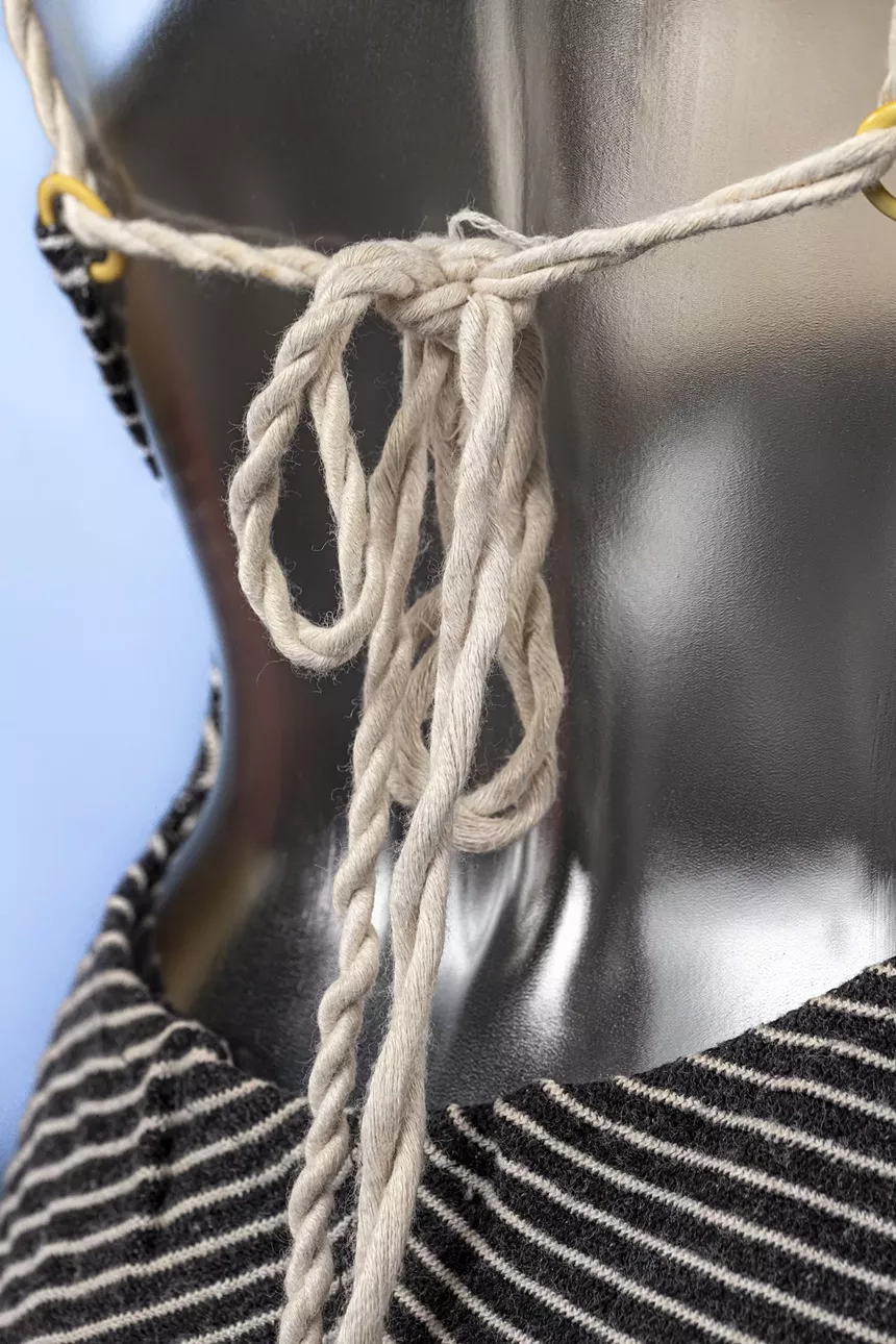 close-up of the rope strap on a 1950s swimsuit