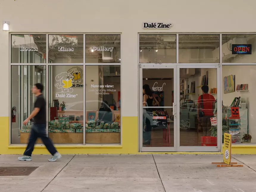 a man walks past the Dalé Zine storefront in Miami