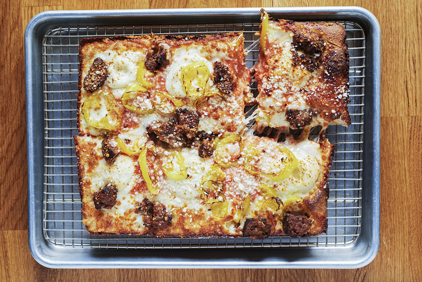 a pizza with toppings