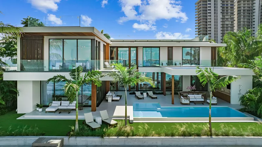 straight on view of back of modern mansion