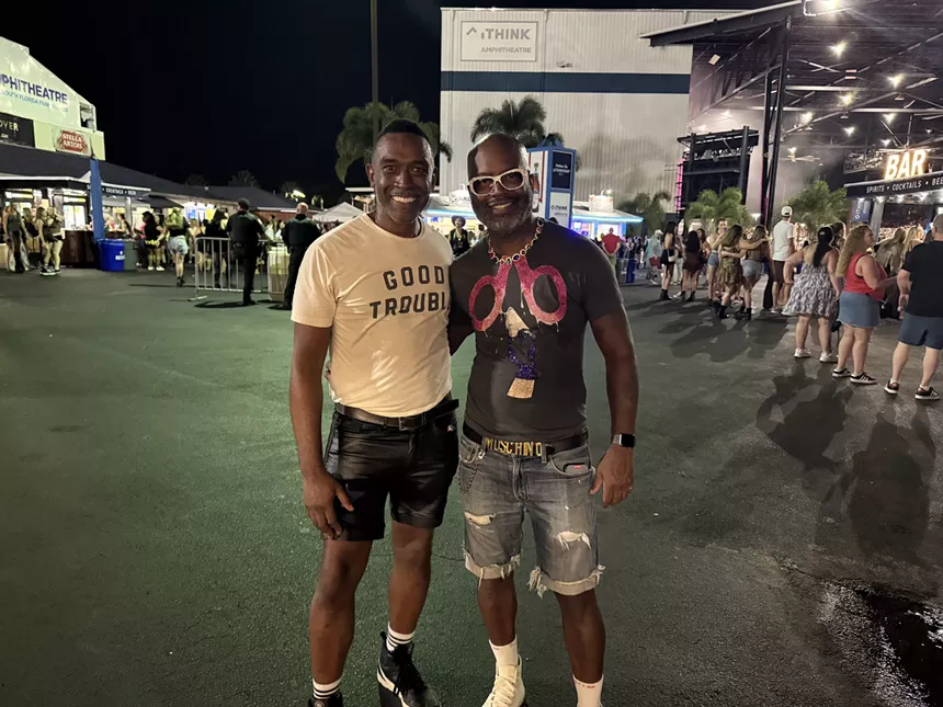 Two men at a concert