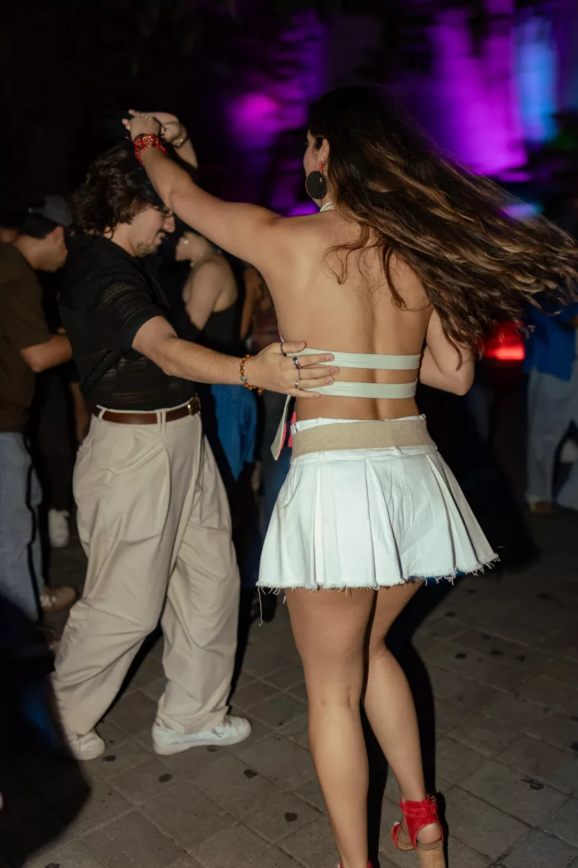 Young people dancing salsa