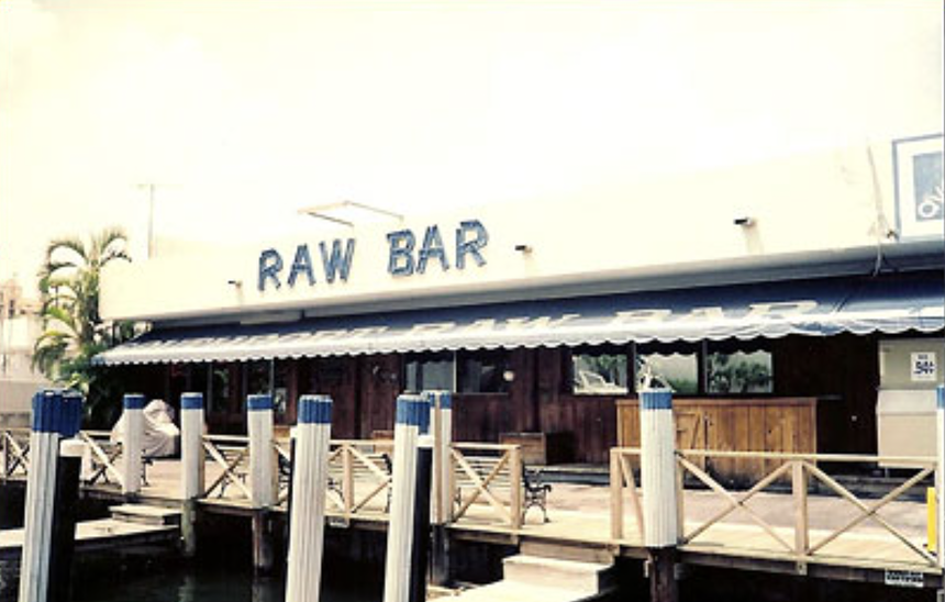 a vintage photo of the exterior of a restaurant