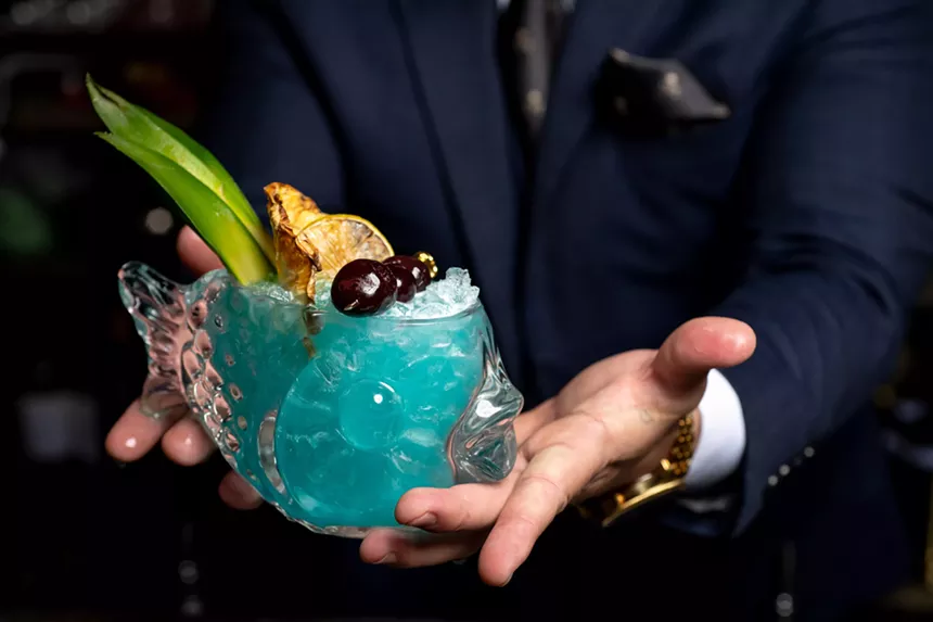 a blue fishbowl cocktail