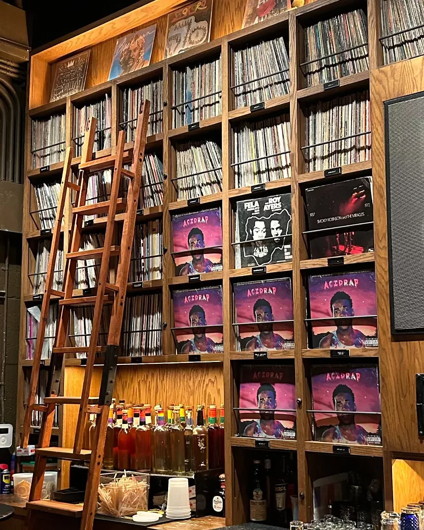 Copies of the Acid Rap 10th Anniversary vinyl on display at Dante's HiFi.