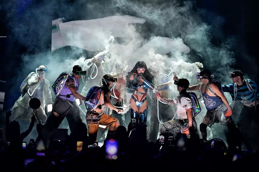 Katy Perry on stage with dancers.
