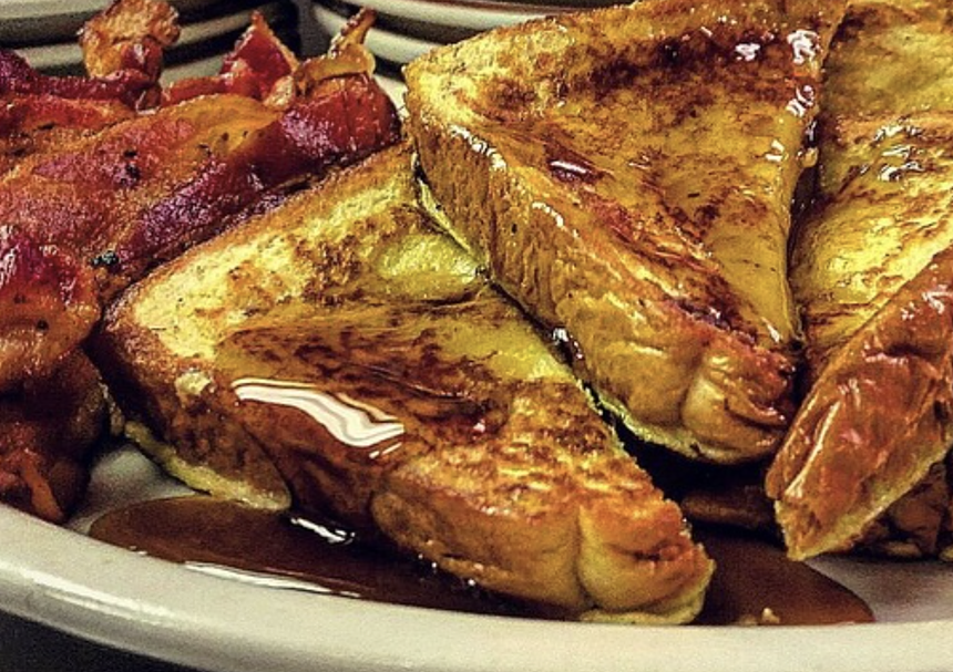 French toast and bacon on plate
