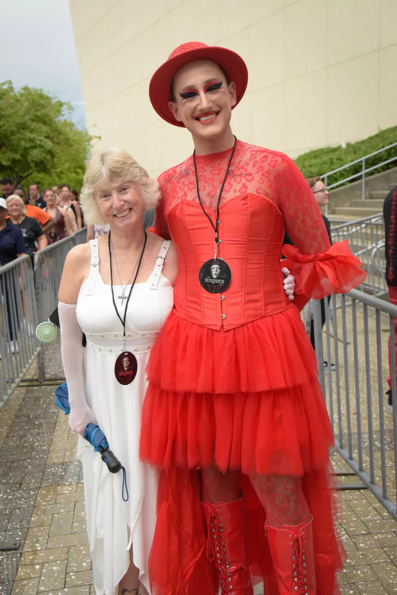 Mother ans son posing outside a Lady Gaga concert in Miami.