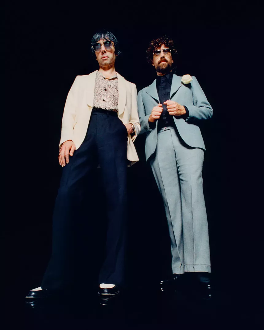 Image of two men wearing suits