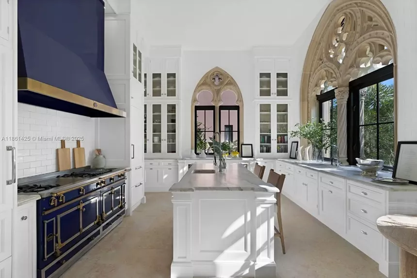 Depicted is a kitchen with costly modern appliances.