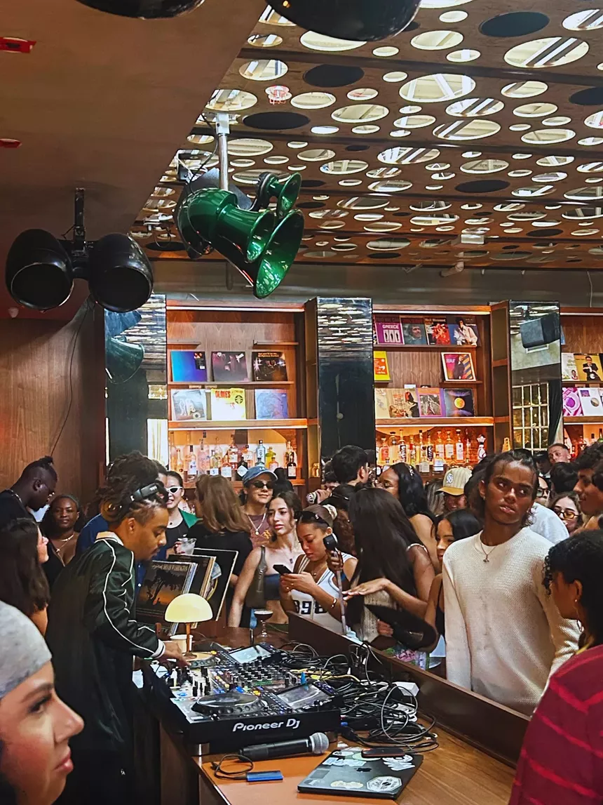 Picture of a DJ performing in an indoor venue during the day