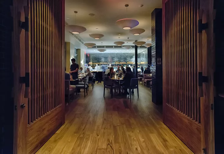 The restaurant's grand yet understated entrance. - COURTESY OF STEVE HILL AND BLUE RIBBON SUSHI BAR & GRILL