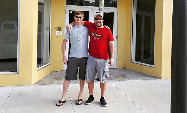 Odd Breed Wild Ales brewer and cofounder Matt Manthe (left) and cofounder Daniel Naumko stand outside their Pompano Beach facility. - PHOTO COURTESY OF ODD BREED WILD ALES