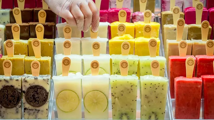 The hand-crafted ice pops contain whole pieces of fruit and even entire cookies. - MORELIA GOURMET PALETAS