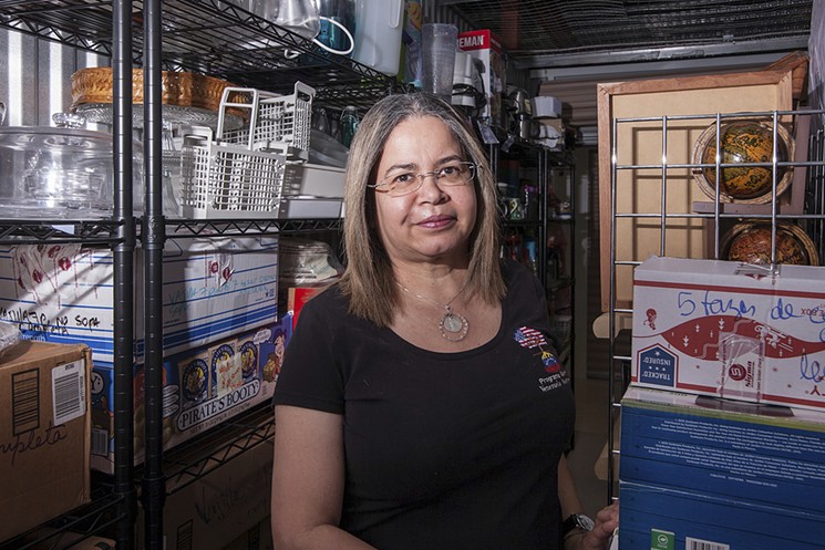Patricia Andrade runs a nonprofit, Raices Venezolanas, that helps destitute Venezuelans who have just arrived in Miami. - PHOTO BY MONICA MCGIVERN