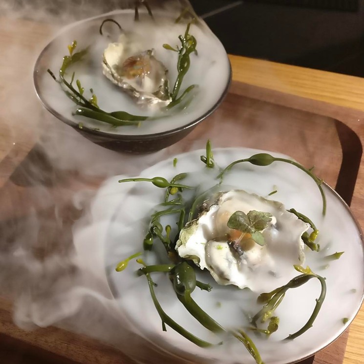 Daily oysters served in a cloud of hazy liquid nitrogen - COURTESY OF DASHI