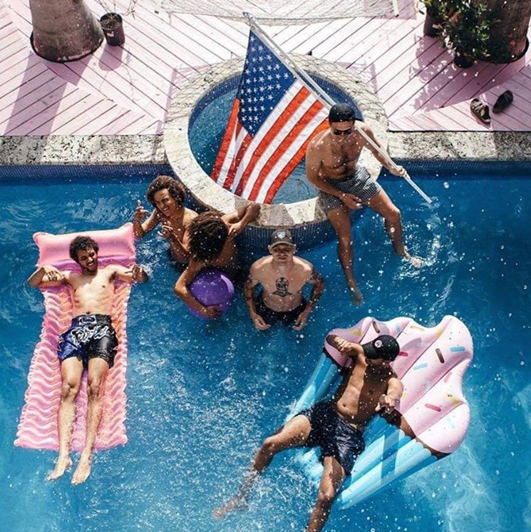 The South Beach staff lounges in the pool at the Joe House. - COURTESY OF JOE & THE JUICE