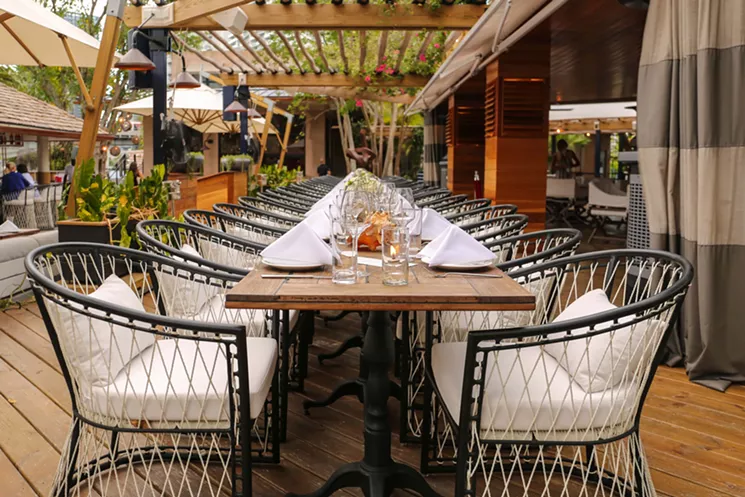 Thursday nights, take a seat at the Table to embark on a $39 three-course, communal dinner. - COURTESY OF RIVER YACHT CLUB