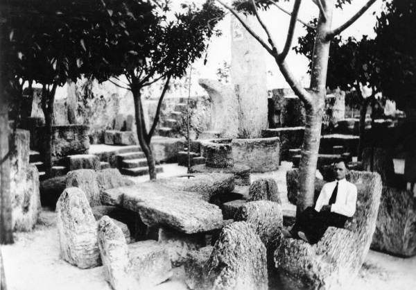Edward Leedskalnin sits in a chair at Coral Castle. - STATE ARCHIVES OF FLORIDA, FLORIDA MEMORY